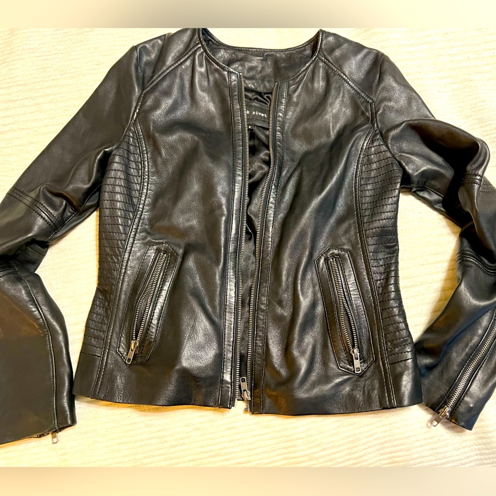 Black leather jacket size S with zippers